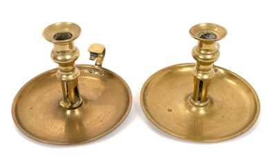 Lot 125 - Pair of Victorian Royal brass chamber candlesticks from Buckingham Palace, of circular form