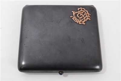 Lot 986 - Gunmetal cigarette case - manner of Fabergé