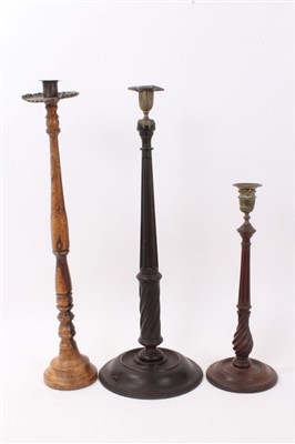 Lot 849 - 18th century lignum vitae candlestick