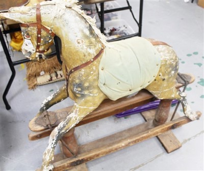 Lot 2876 - Late 19th century rocking horse on pine cantilever base.