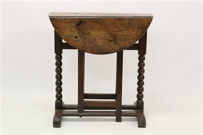 Lot 1360 - Rare 17th century oak drop leaf table