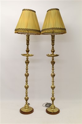 Lot 1368 - Pair impressive eastern brass lamp standards with engraved decoration
