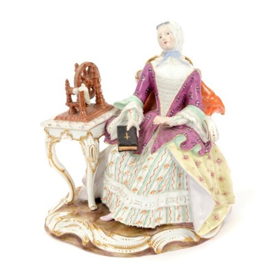 Lot 66 - 19th century Meissen outside decorated figure of a seated lady holding a bible