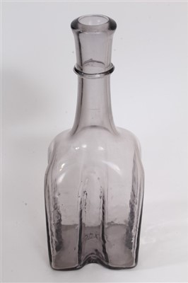 Lot 87 - Antique grey glass bottle with string collar