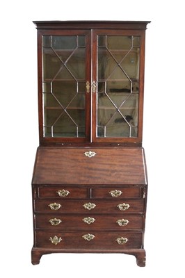 Lot 1421 - George III mahogany bureau bookcase