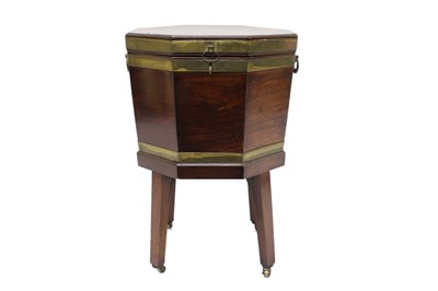 Lot 1369 - George III mahogany and brass bound cellarette of typical form