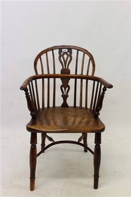 Lot 1380 - Early 19th century yew and elm stick back elbow chair