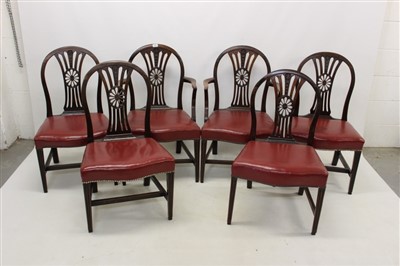 Lot 1382 - Set of ten George III Hepplewhite-style wheelback dining chairs