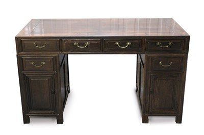 Lot 1397 - Chinese Rosewood twin pedestal desk with four drawers, each pedestal with a further drawer and cupboard door below 143cm wide x 69cm deep x 83cm high