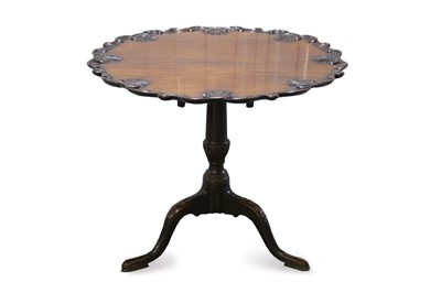 Lot 1400 - Impressive George III-style carved mahogany supper table, the tilt top with carved shell and rococo scroll pie crust edge on turned column with carved tripod base 87cm diameter