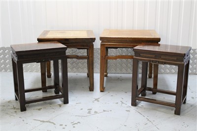 Lot 1403 - Two Chinese elm lamp tables together with a pair of Chinese rosewood occasional tables