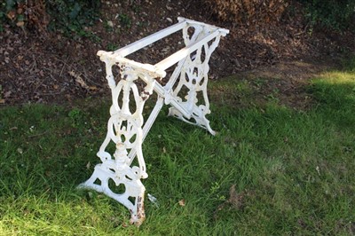 Lot 1416 - Victorian cast iron and marble topped table, rectangular marble top on white painted base with ornate supports centred by initials WH