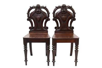 Lot 1460 - Pair of early Victorian mahogany hall chairs