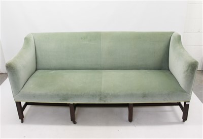 Lot 1337 - George III and later sofa, squared form, green velvet upholstery on square supports and stretchers and brass castors