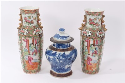 Lot 144 - Pair of 19th century Chinese Canton vases, together with Chinese baluster blue and white vase and cover