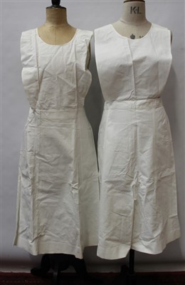 Lot 3067 - Box of vintage clothing including Gentlemen's fly front flannel jodhpurs and black and white dog tooth wool breeches, three frilly aprons with matching head bands, one with Selfridge London label,...