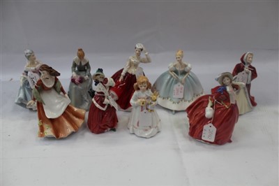 Lot 2042 - Eight Royal Doulton figures - Rachel HN2936, Christmas Morn HN1992, Gail HN2937, Dorothy HN3098, Autumntime HN3231, Bunny's Bedtime HN3370, Southern Belle HN2425 and Autumn Breezes HN1934