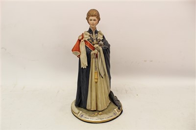 Lot 2078 - Capodimonte porcelain figure, Queen Elizabeth, limited edition No. 139, together with a Coronation Souvenir Bust of Elizabeth II (2)
