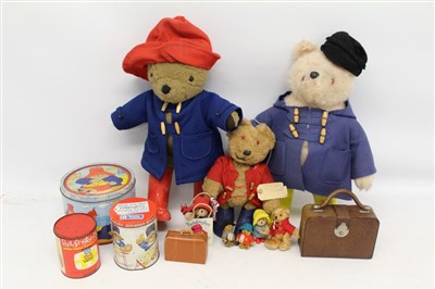 Lot 2782 - Group Paddington Bear items including bear by Gabrielle Designs wearing yellow Wellington boots, other bears and vintage tins.