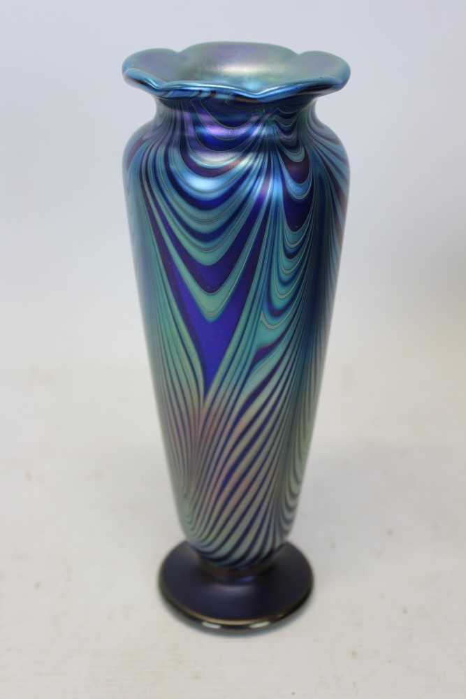 Lot 2083 - Okra Glass Studios ‘Nebular’ iridescent glass vase designed by Richard Golding and made by Nicola Osborne, signed ‘Okra 88 NTV No. 11’ with original card label and box. height 21.5 cm