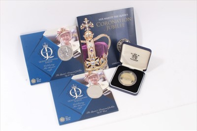 Lot 214 - Three Royal Mint coin presentation packs and a comm. medallion