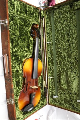 Lot 3585 - A Czechoslovakian viola bearing label stating ‘Antonius Stradivarius Cremonensis Faciebat anno 1713’, length of back including button 41cm, with bow, in fitted travelling case