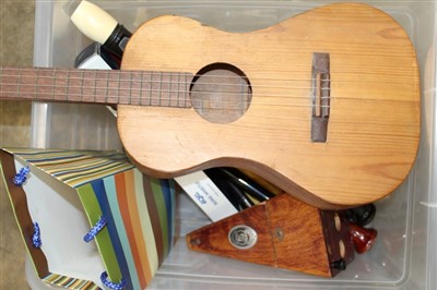Lot 148 - A German metronome, an assortment of six recorders, piccolo, child’s guitar and other accessories