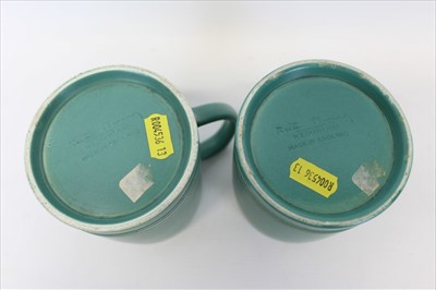 Lot 72 - Pair of green Keith Murray Wedgewood tankards, 12cm high