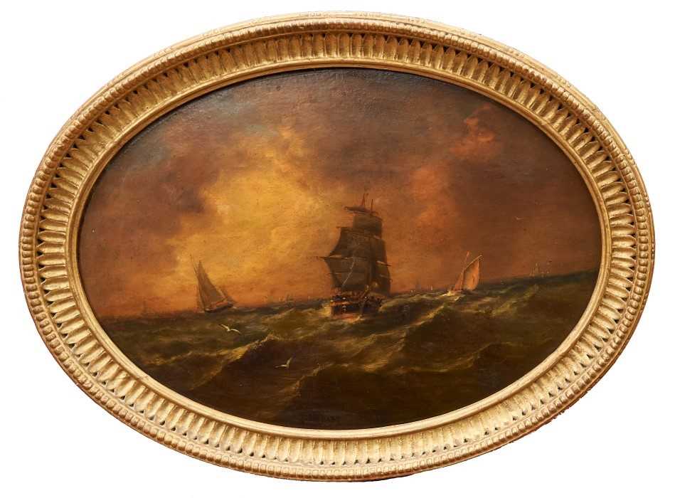 Lot 1048 - John Moore of Ipswich oval oil on panel - shipping at dusk, signed, in oval gilt frame, 32cm x 45cm