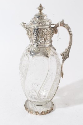 Lot 142 - Victorian silver mounted clear glass claret jug with  "rock crystal" decoration