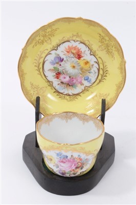 Lot 28 - Meissen tea cup and saucer with floral decoration on yellow ground