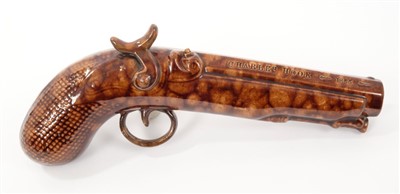 Lot 93 - Staffordshire pottery pistol flask