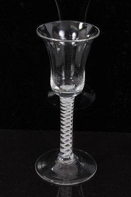 Lot 69 - 18th Century wine glass with bell bowl, double series opaque twist stem on splayed foot.