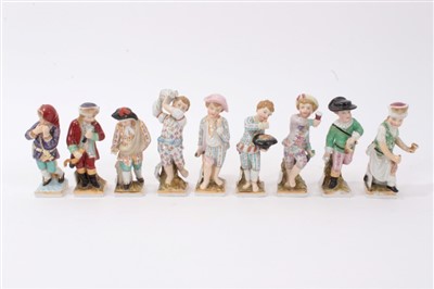 Lot 88 - Nine late 19th century Dresden porcelain figures emblematic of the months and seasons of the year-each titled 10cm