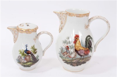 Lot 134 - A Berlin bird painted coffee pot and a milk jug and cover