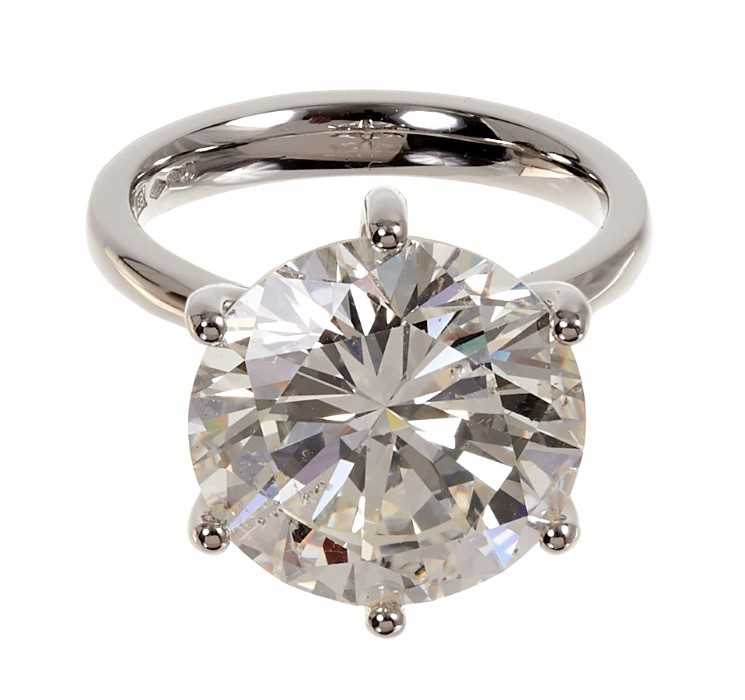 Lot 406 - A fine diamond single stone ring with a brilliant cut diamond weighing 10.83 carats, accompanied by an Anchorcert Diamond Report dated 16th August 2019 stating the weight, colour K, clarity SI1, cu...