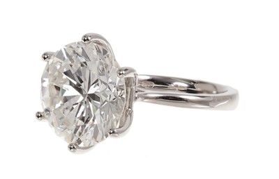 Lot 406 - A fine diamond single stone ring with a brilliant cut diamond weighing 10.83 carats, accompanied by an Anchorcert Diamond Report dated 16th August 2019 stating the weight, colour K, clarity SI1, cu...