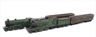 Lot 266 - Highly unusual group of painted iron train paperweights