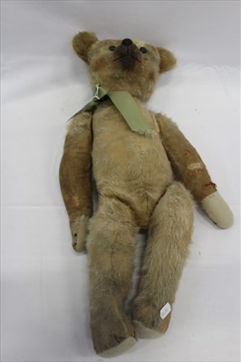 Lot 2883 - Teddy bear approx. 1912 with boot button eyes, shaved snout and small hump