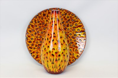Lot 2042 - Anita Harris Studio Charger with orange and red decoration (40cm in diameter), together with a similar vase approx 39cm in height (2)