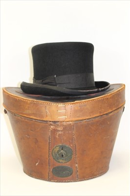 Lot 3099 - Vintage black felt 'John Bull' top hat by Wilson and Stafford in an antique fitted leather top hat box