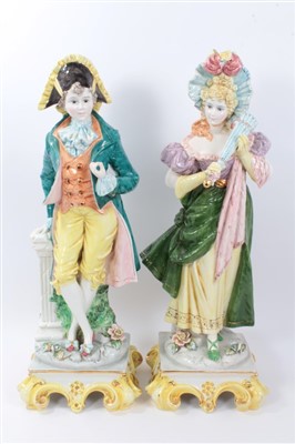 Lot 334 - Pair of Continental period costume figurines with decorative bases