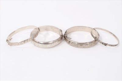 Lot 3226 - Four silver bangles