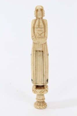 Lot 1152 - Scarce early 18th century whalebone hand carved pipe tamper in the form of a Protestant priest with concealed genitalia
