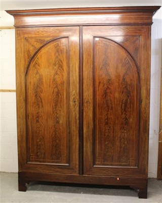 Lot 994 - Large early 19th century mahogany and barber-pole strung armoire