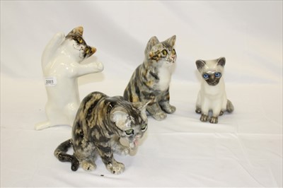 Lot 2085 - Four Winstanley china cats
