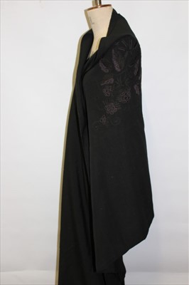 Lot 3074 - Large black Victorian shawl with black and purple silk embroidery and fringing. 1930's Bavarian straw hat with red pompoms,  three other straw hats with ribbons,  large c1930's crewel work bag plus...