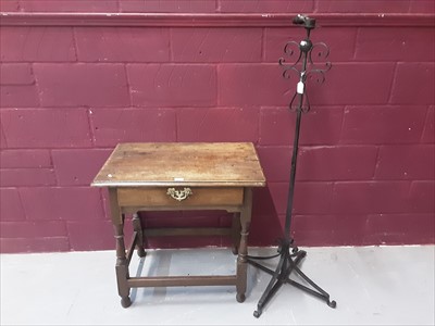 Lot 852 - Antique oak side table with single drawer on turned and block legs and a wrought iron stand