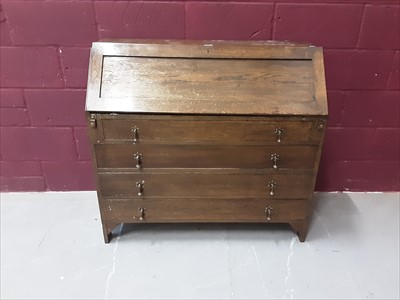 Lot 854 - Old oak bureau with four drawers