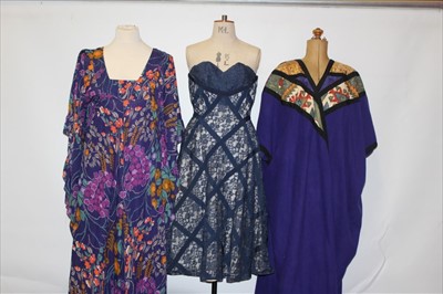 Lot 3103 - 1950's and 70's dresses including blue lace strapless dress, printed hostess dress with bat wing sleeves,  printed corduroy dress by Sherry, Jean Allen abstract print jump suit and a purple wool ka...